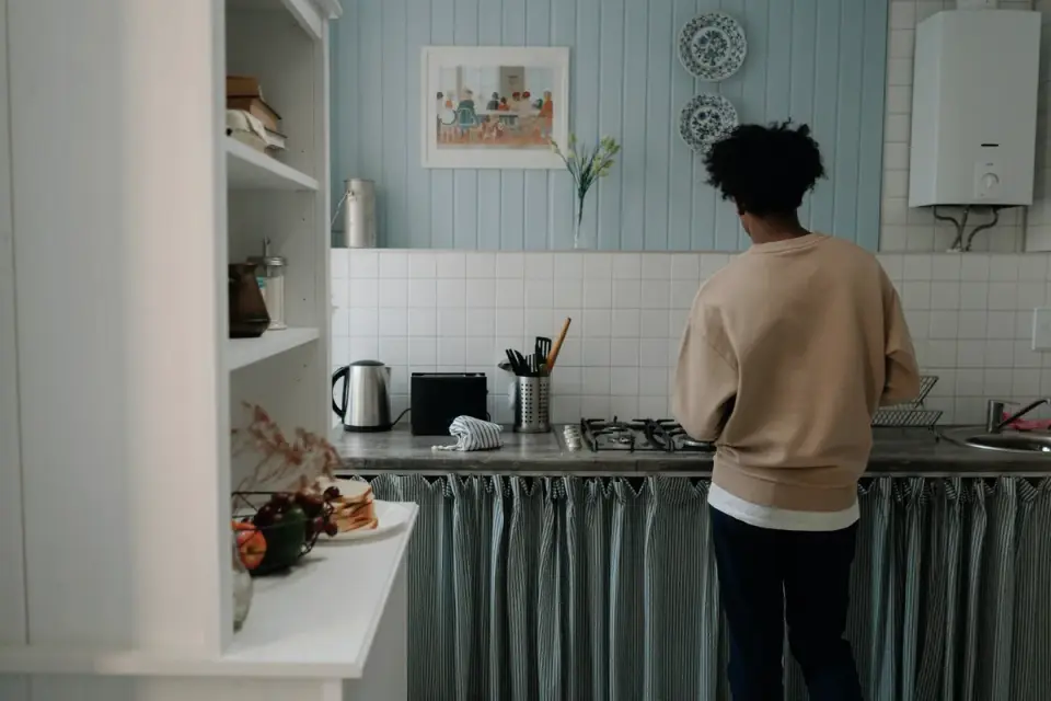 Dog in kitchen with owner