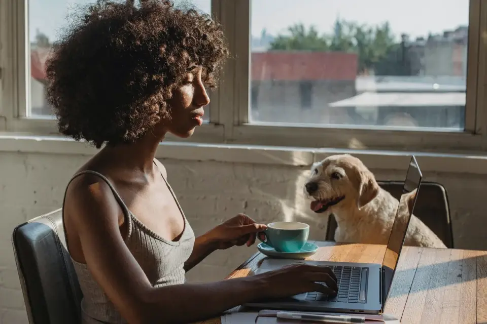 Dog in kitchen with owner