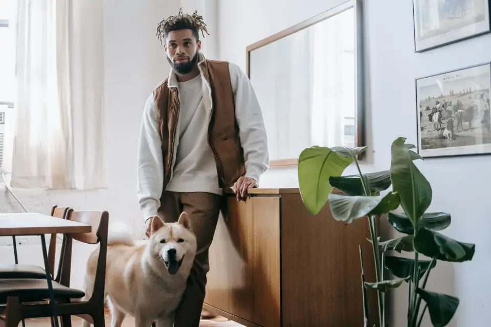 Dog in kitchen with owner