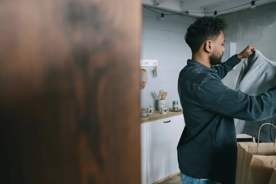 Dog in kitchen with owner