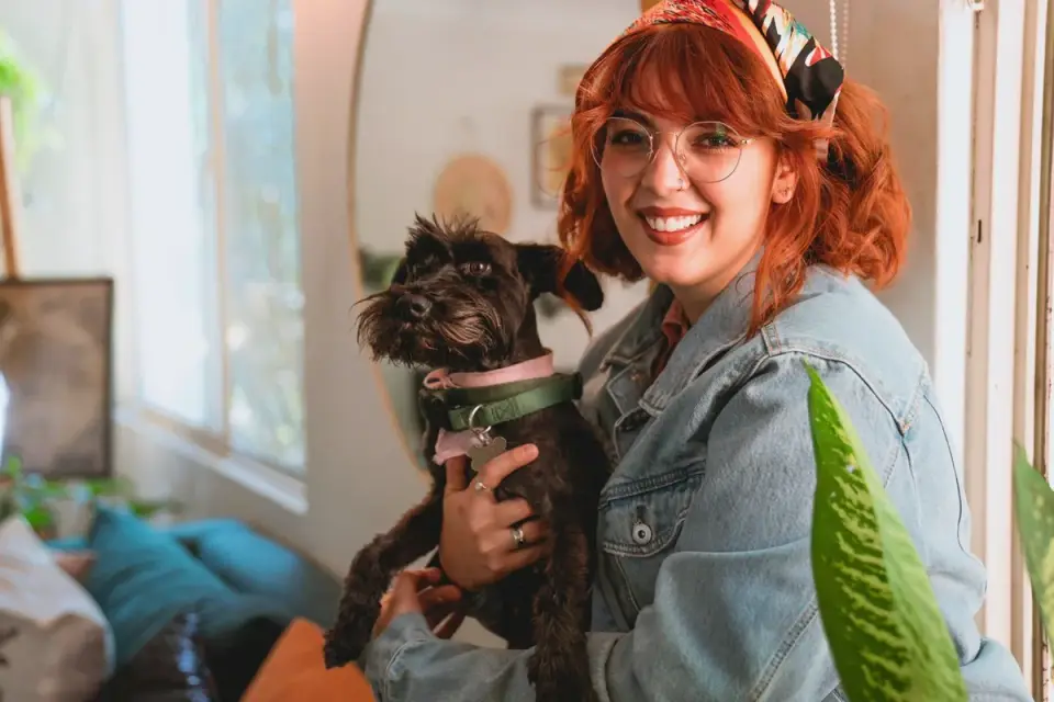 Dog in kitchen with owner