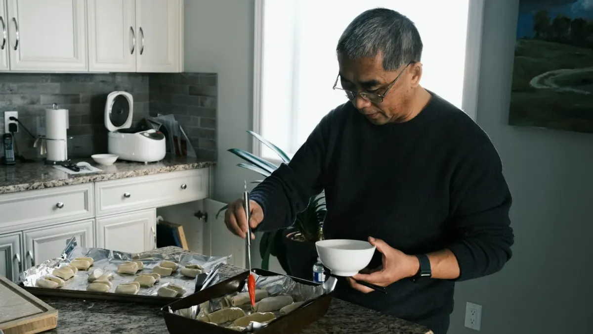 Dog owner preparing a meal