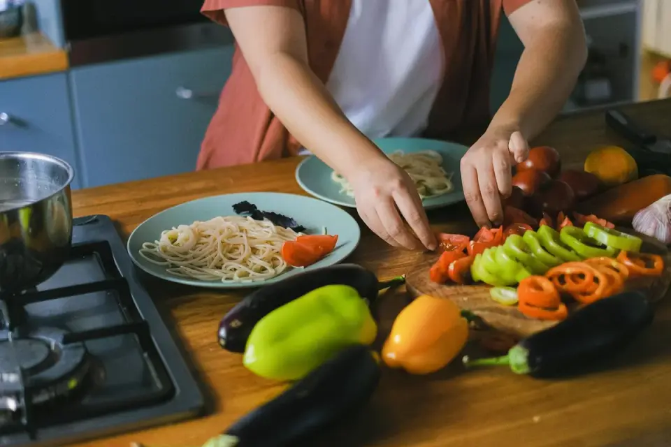 Dog owner preparing a meal