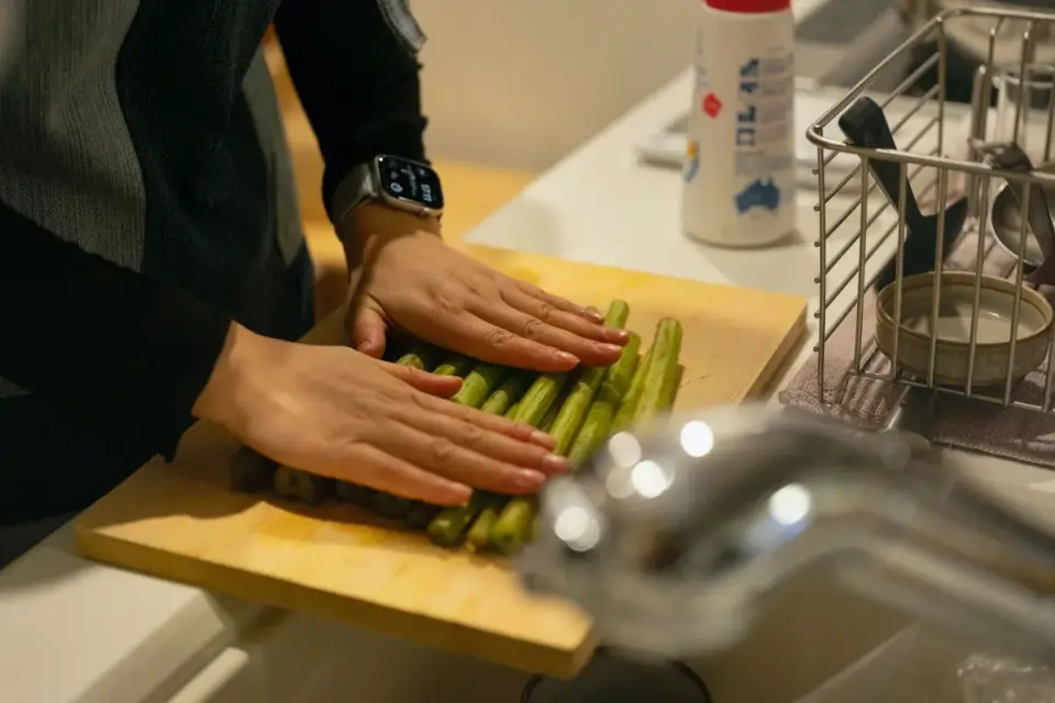 Dog owner preparing dog food kitchen
